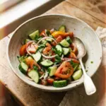 Fresh Cucumber Tomato Salad with vibrant vegetables in a bowl
